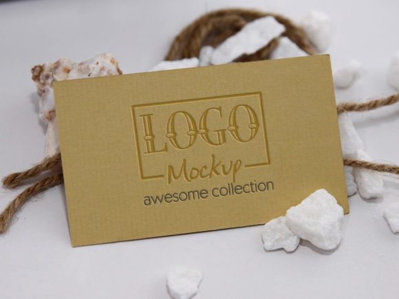 Logo Mockup on White Stones and Seashels