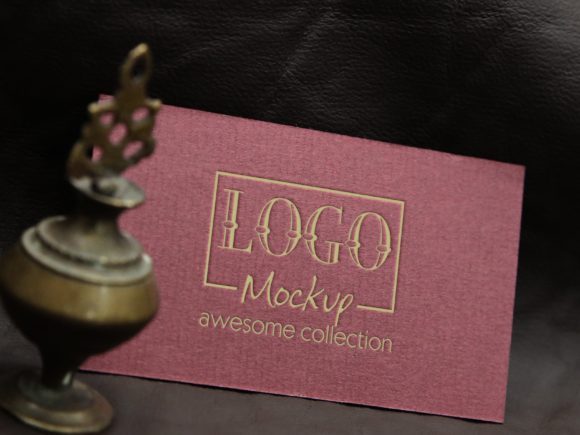 Logo Mockup with Vintage Miniature Lamp