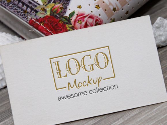 Logo Mockup with White Stones Seashels